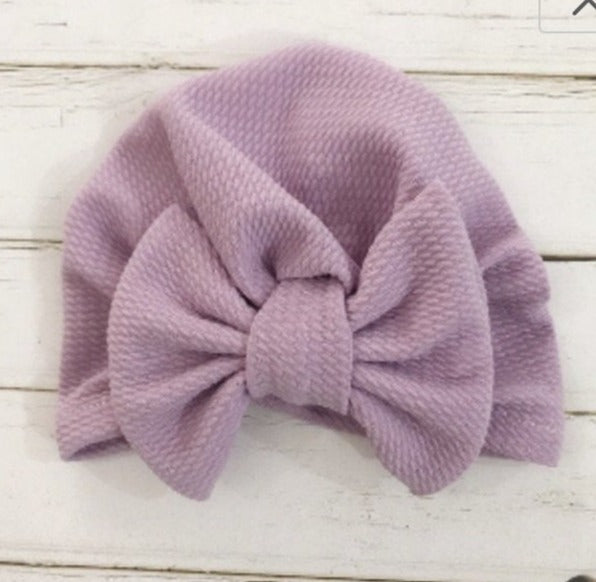 Purple Baby Hat With a Bow