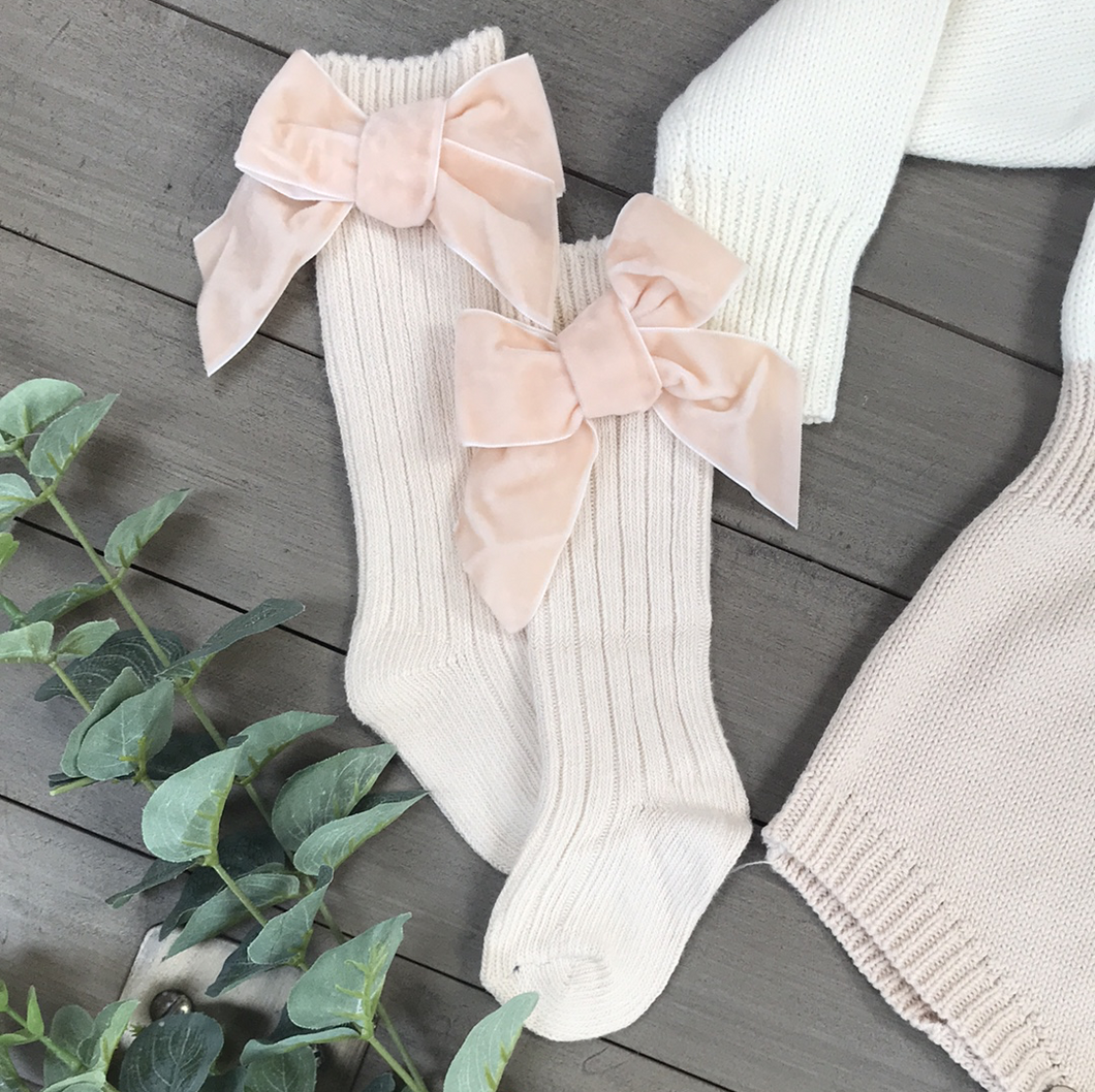 Beige baby knee socks with velvet bow