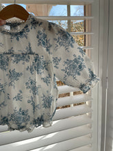 Load image into Gallery viewer, Blue long sleeved floral romper with lace trim
