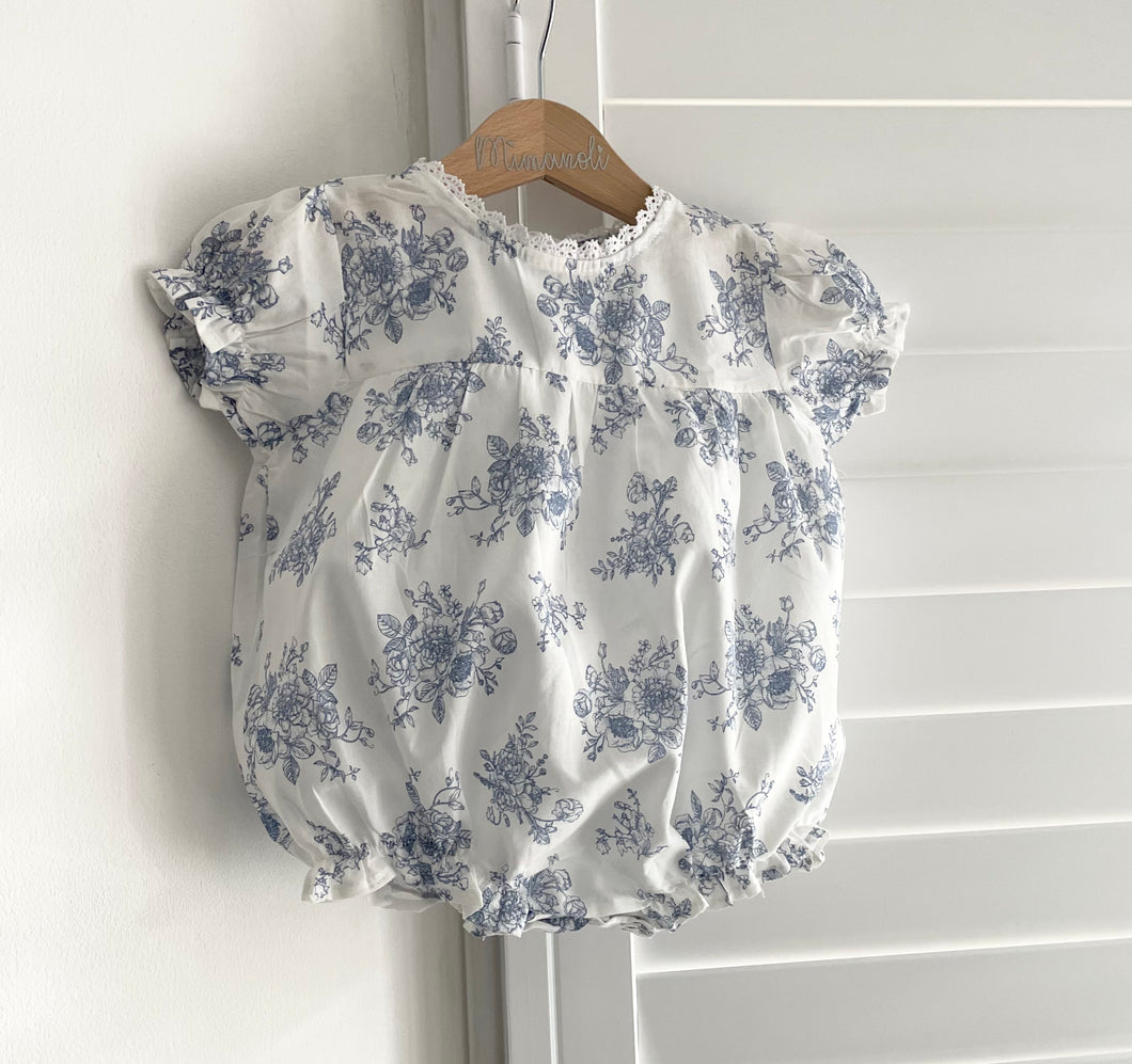 Blue short sleeved floral romper