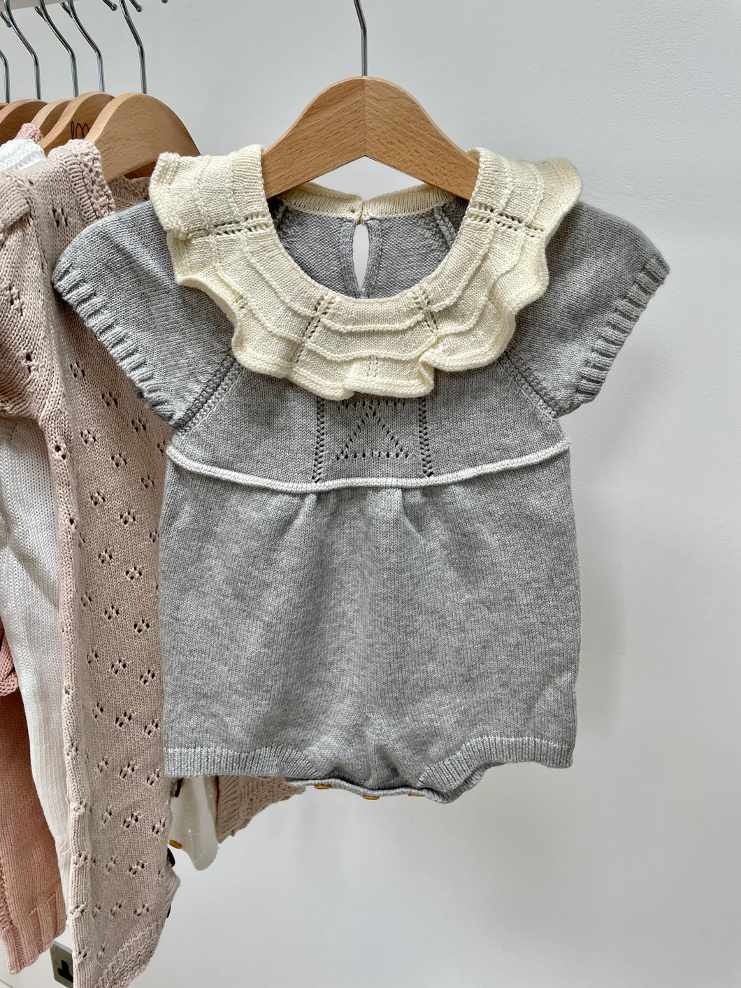 Grey frill neck knitted romper